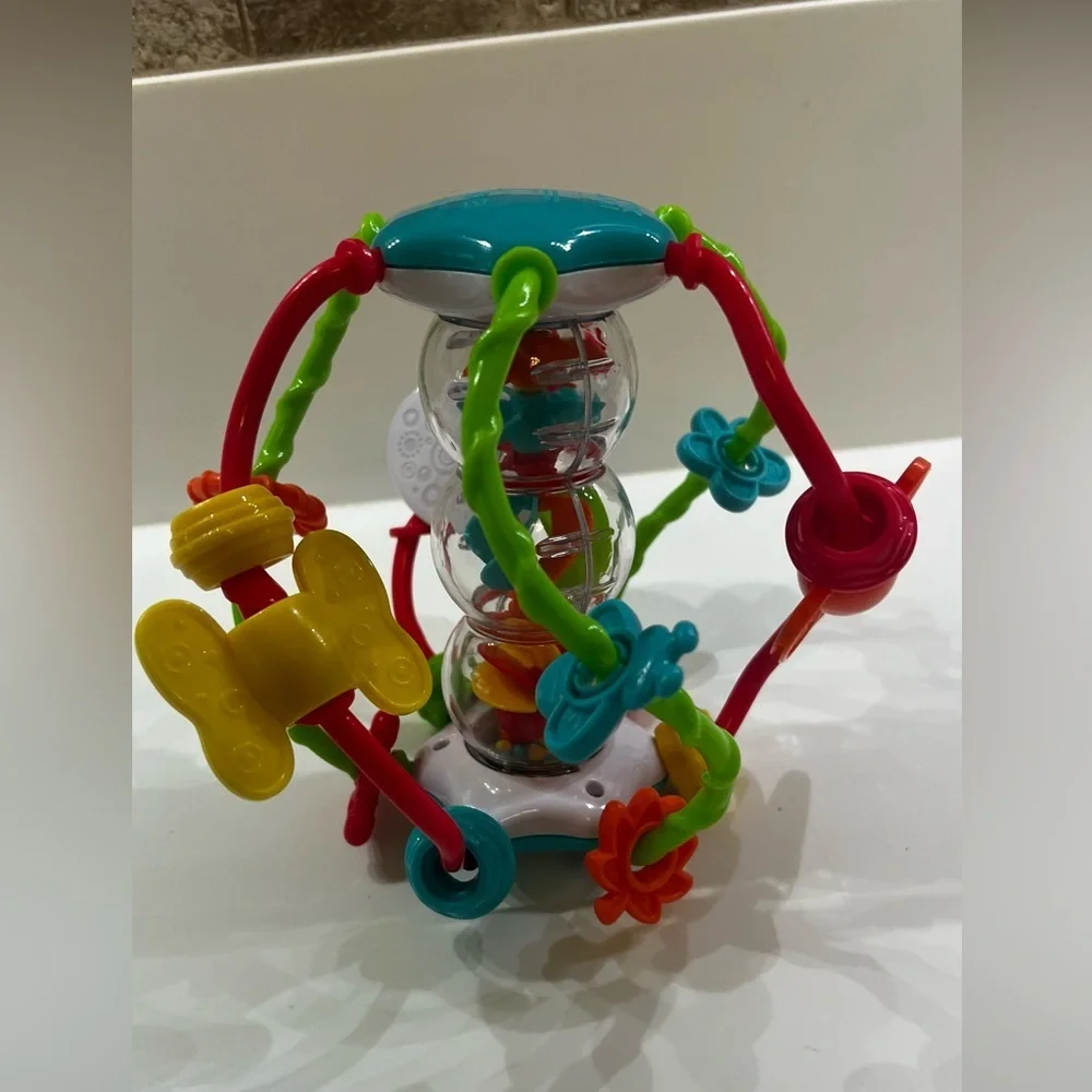 PLAY GO - LITTLE HANDS ACTIVITY BALL.  KEEPS YOUR CHILD’S HANDS BUSY. LIKE NEW